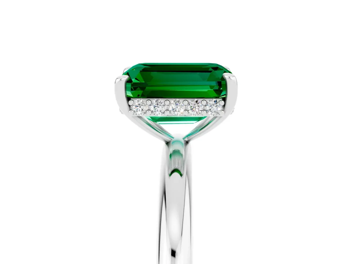 Emerald Cut Emerald Solitaire Ring with Thin Band and Four-Prong Setting White gold