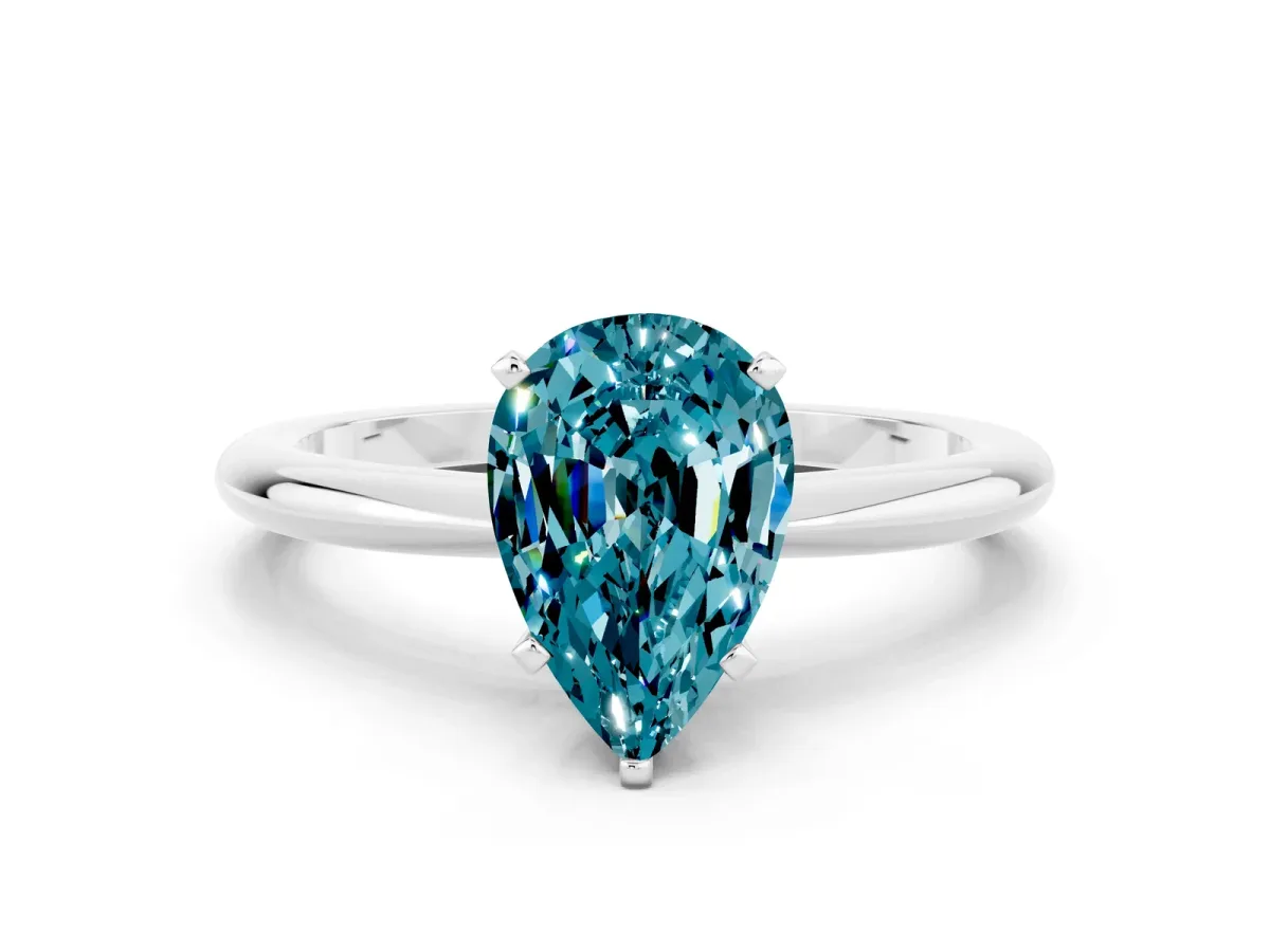 Pear Cut Blue Topaz Solitaire Ring with Six-Prong Setting and Classic Band Platinum