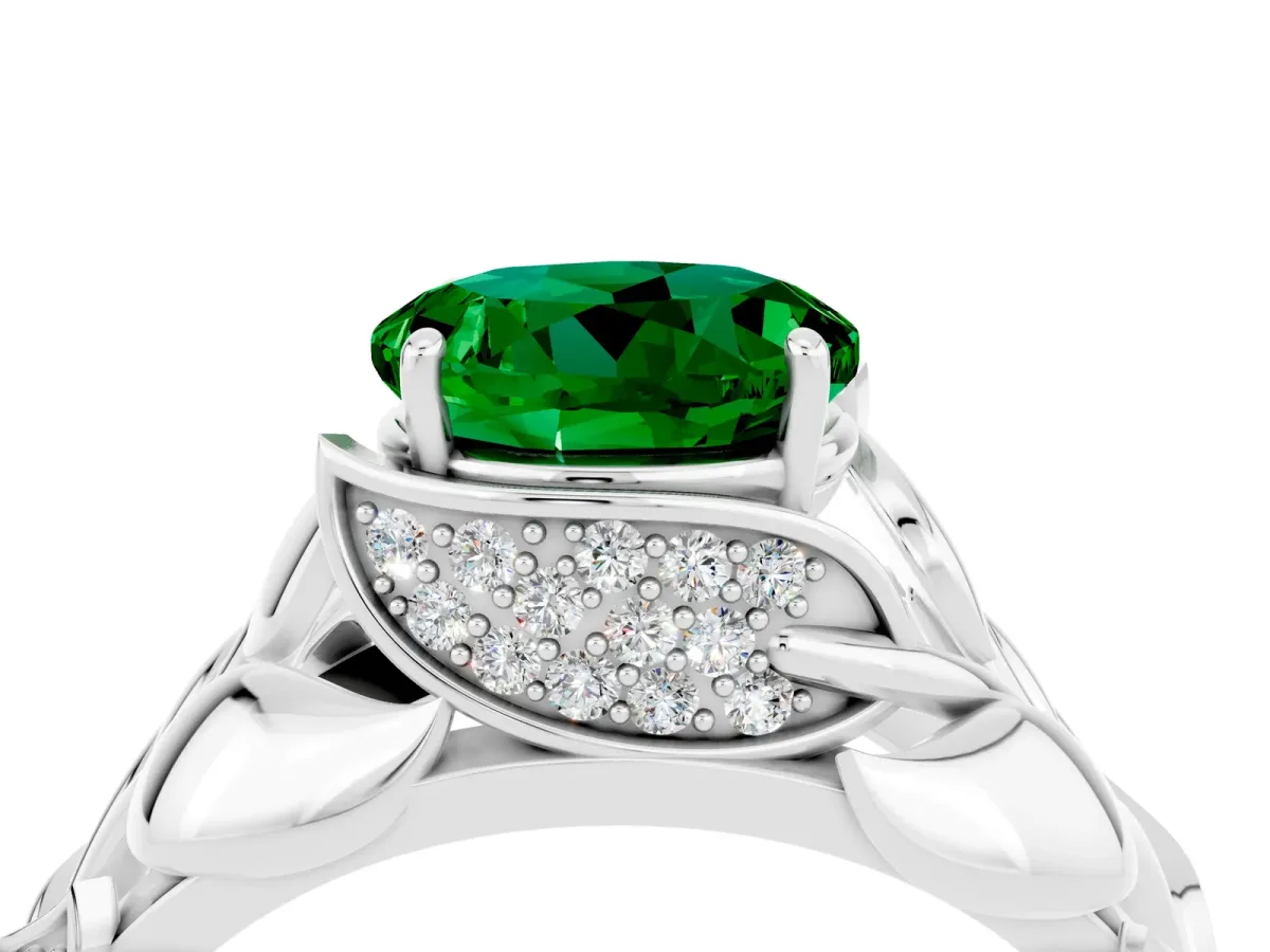 Round Cut Emerald Leaf-Inspired Engagement Ring with Round Accents and Prong Setting Silver