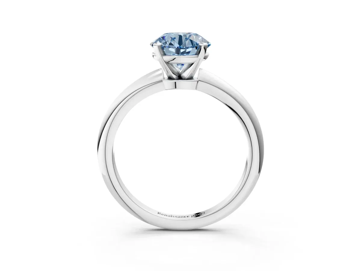 Fancy Blue Round Cut Diamond Solitaire Ring with Six-Prong Setting and Classic Band Platinum