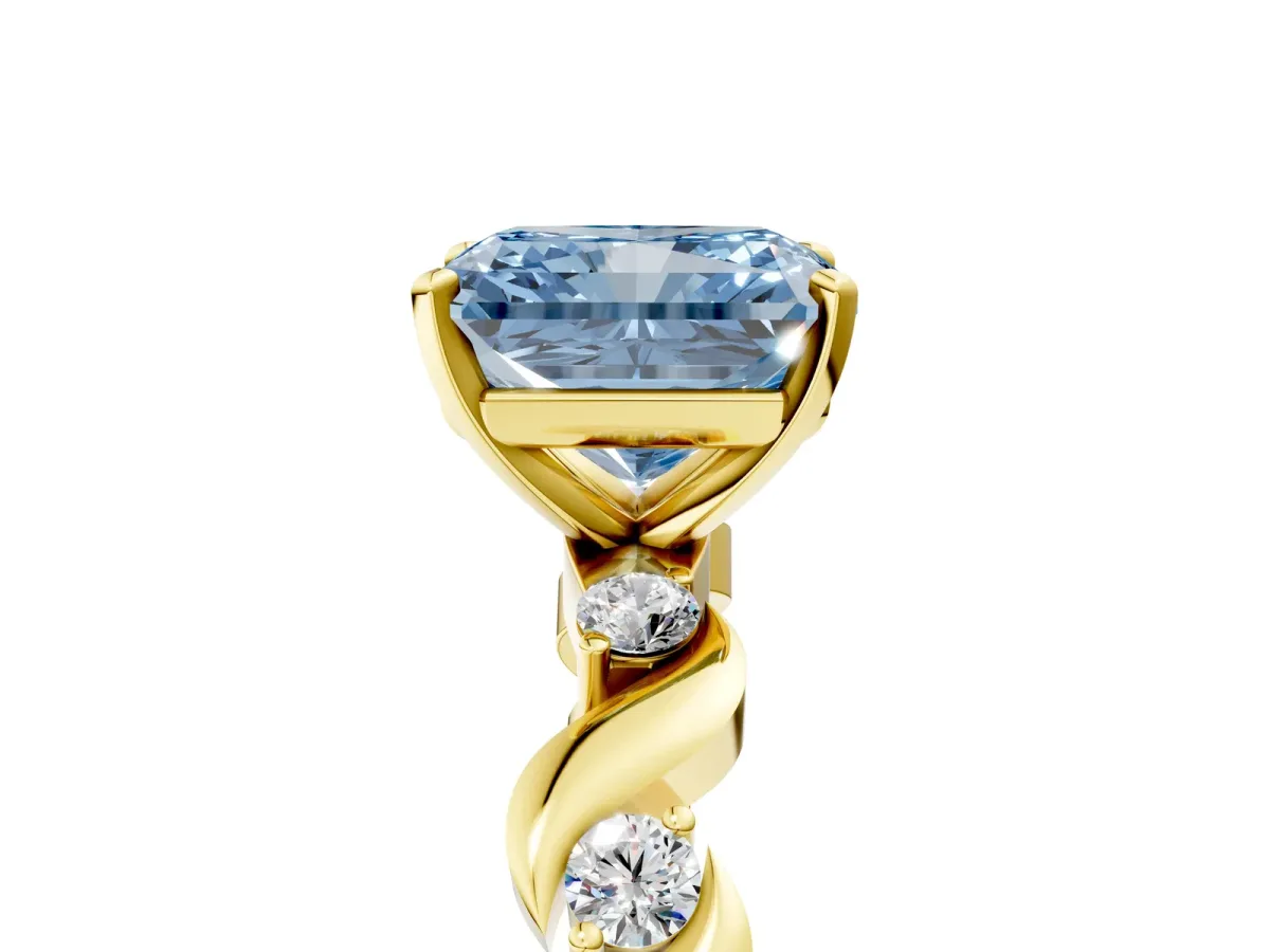 Fancy Blue Radiant Cut Diamond Solitaire Twisted Band with Round Accents and Prong Setting Yellow gold