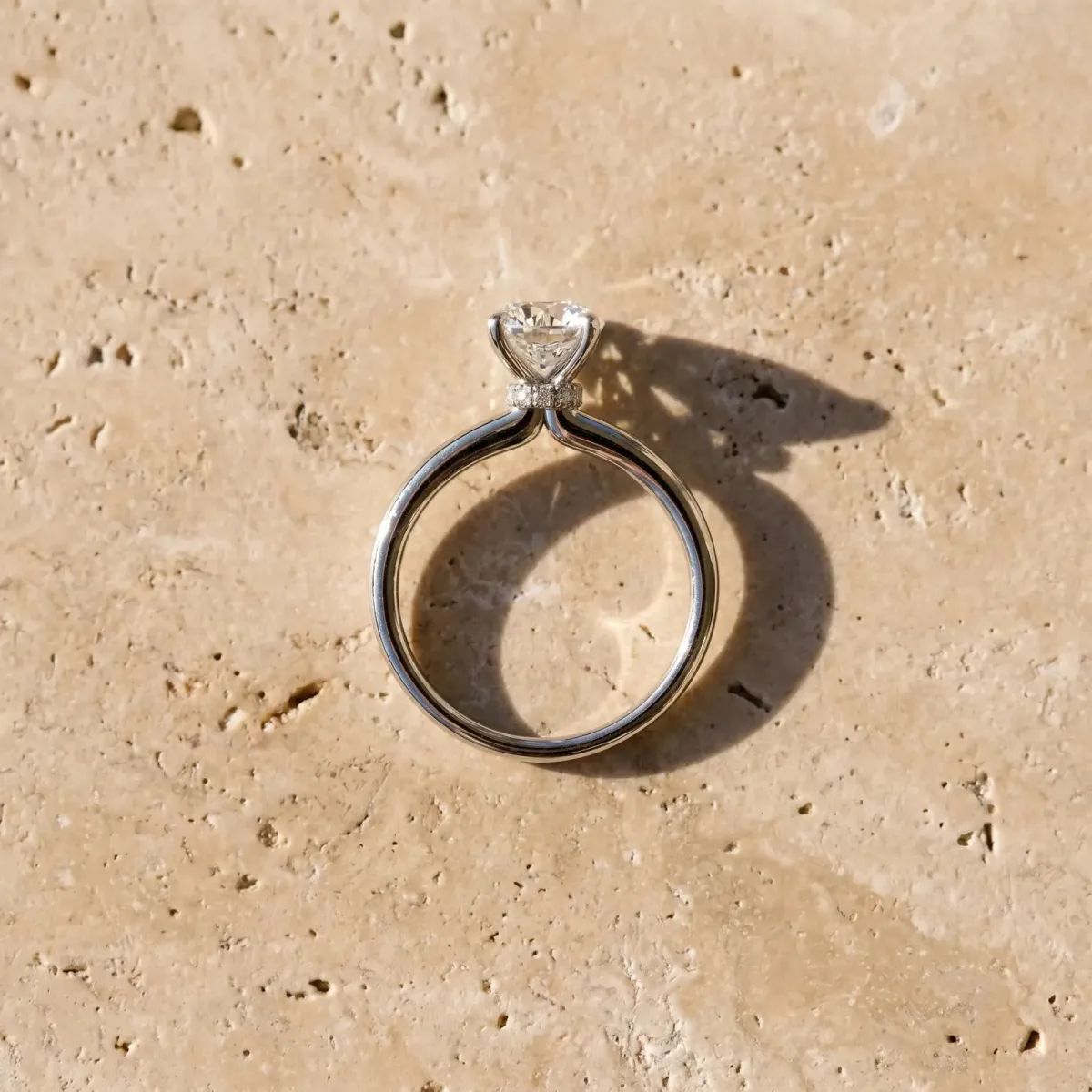 Round Cut Diamond Solitaire Ring with Classic Band and Four-Prong Setting Platinum
