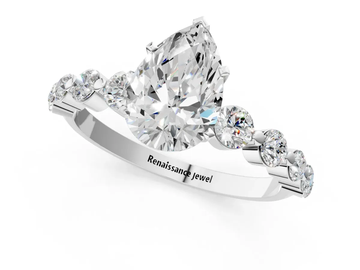 Pear Cut Solitaire Diamond Ring with Pave Band and Four-Prong Setting Silver