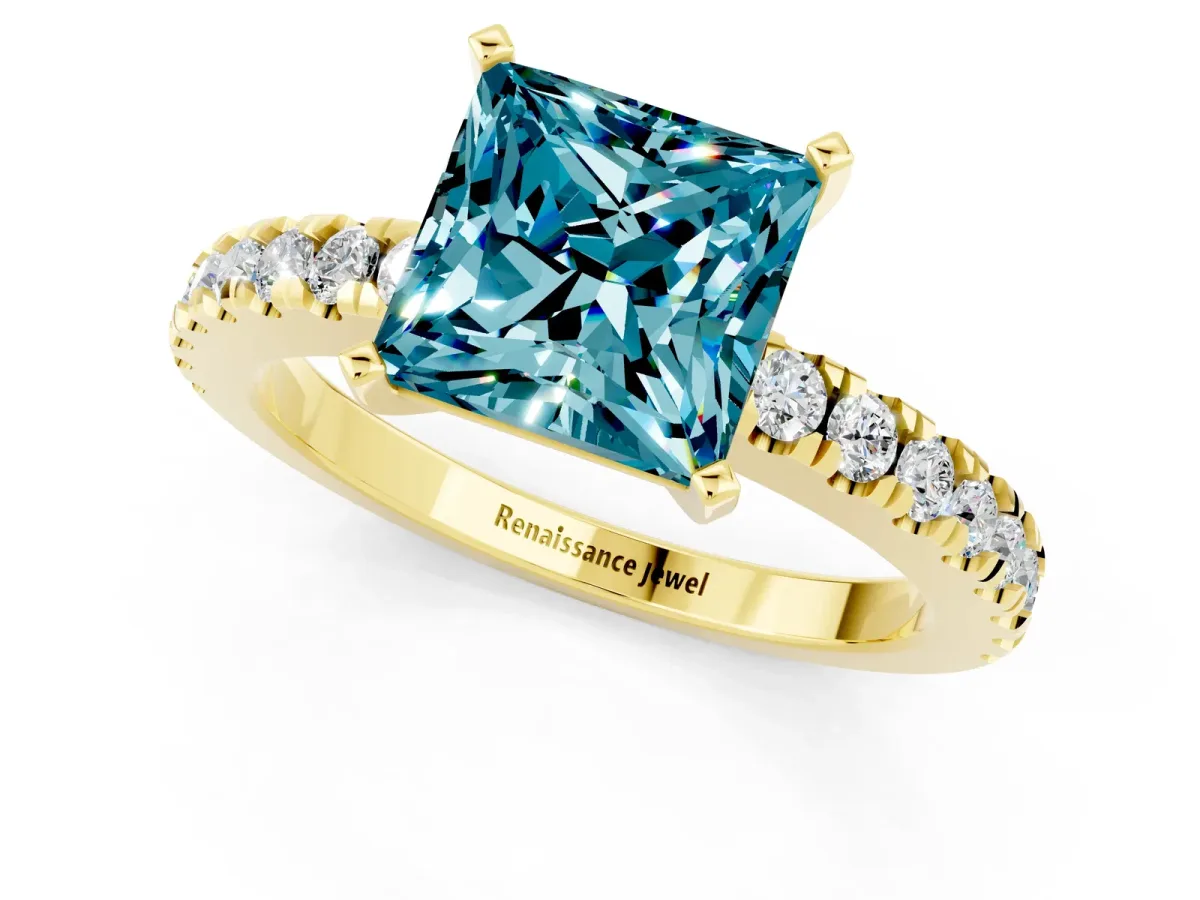 Princess Cut Solitaire Blue Topaz with Pavé Band and Four-Prong Setting Yellow gold