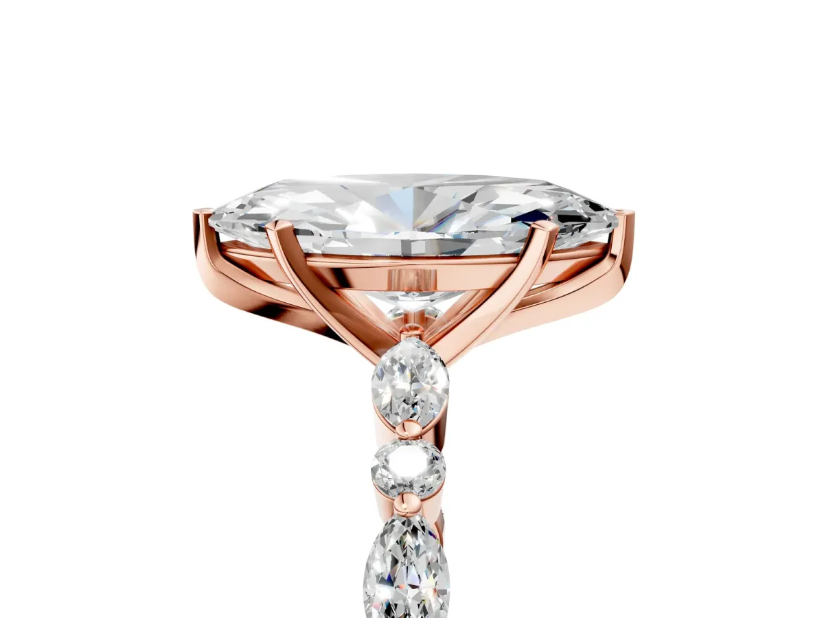 Marquise Cut Diamond Ring with Marquise and Round Side Stones and Four-Prong Setting Rose gold