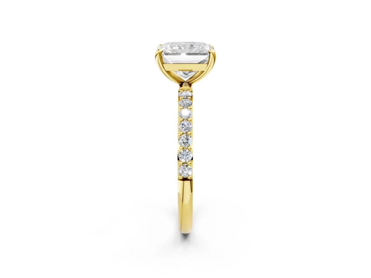 Radiant Cut Diamond Solitaire Ring with Round Moissanite Pavé Band and Prong Setting Yellow gold