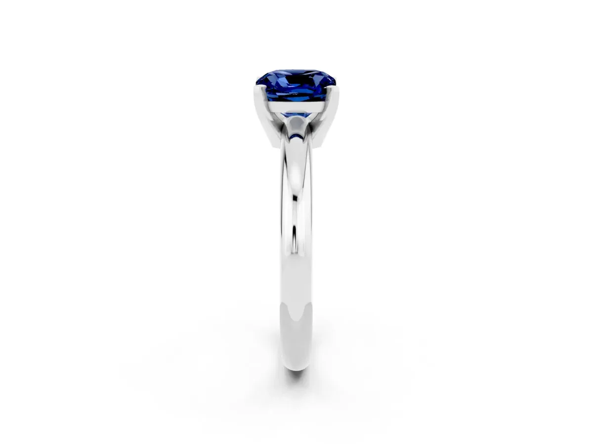 Cushion Cut Blue Sapphire Solitaire Engagement Ring with Round Band and Four-Prong Setting White gold