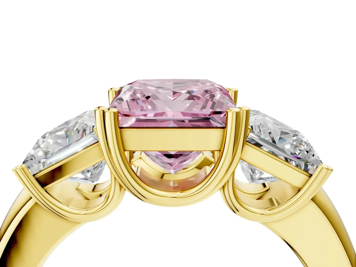 Fancy Pink Three-Stone Princess Cut Cut Diamond Ring with Channel Set Band and Four-Prong Setting Yellow gold