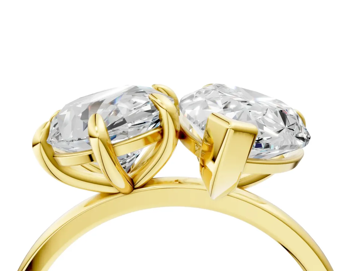 Round Cut and pear toi moi ring Yellow gold