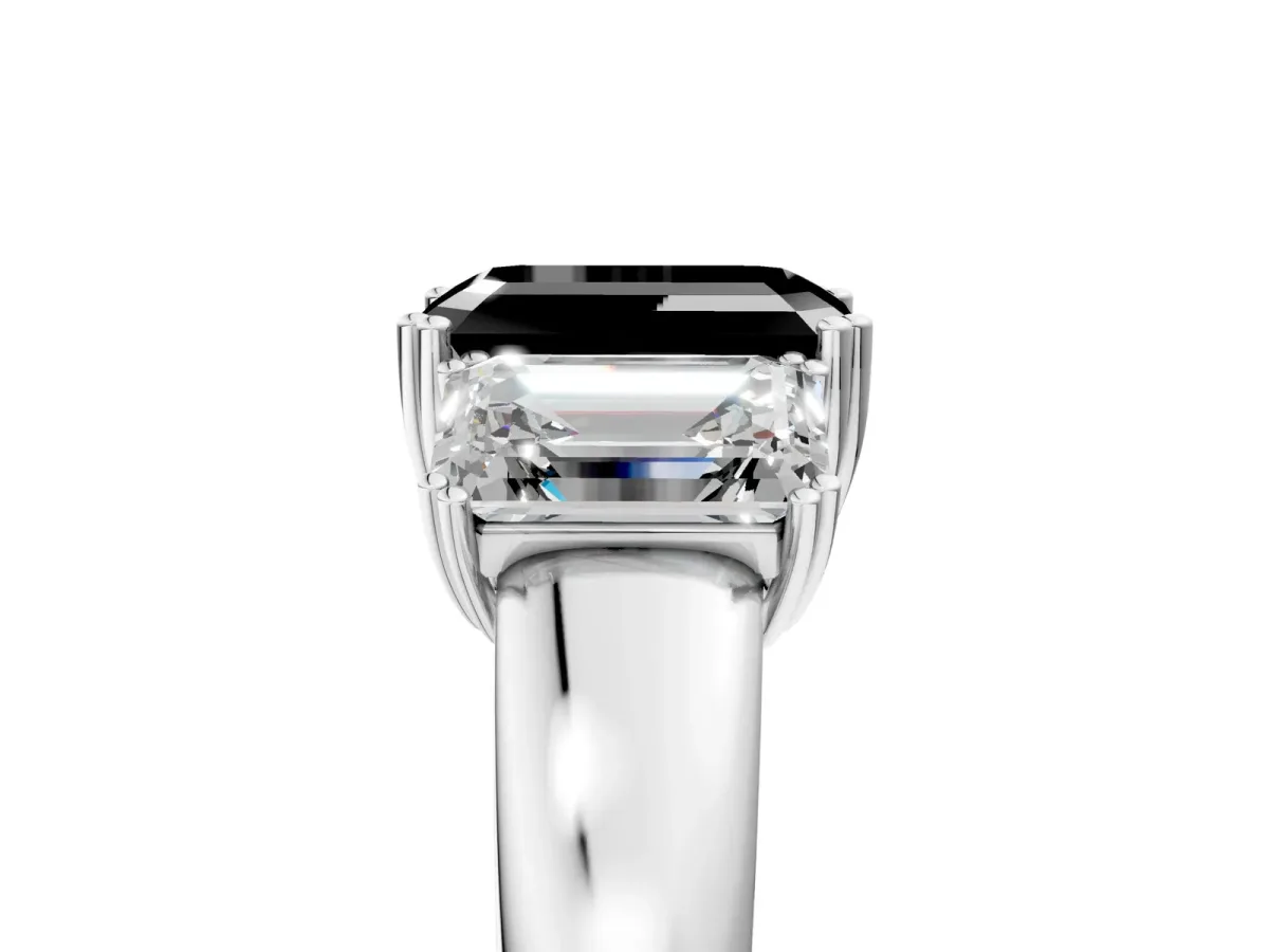 Fancy Black Three-Stone Emerald Cut Cut Diamond Ring with Channel Set Band and Four-Prong Setting Platinum