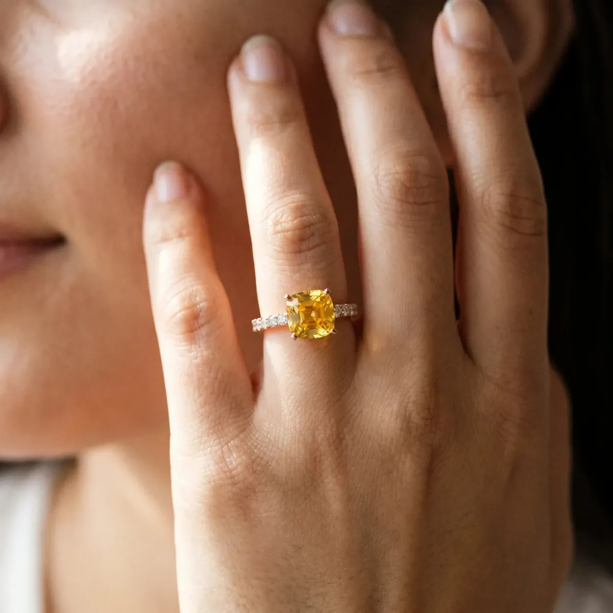 Cushion Cut Yellow Sapphire Solitaire Ring with Round Pavé Band and Four-Prong Setting Rose gold