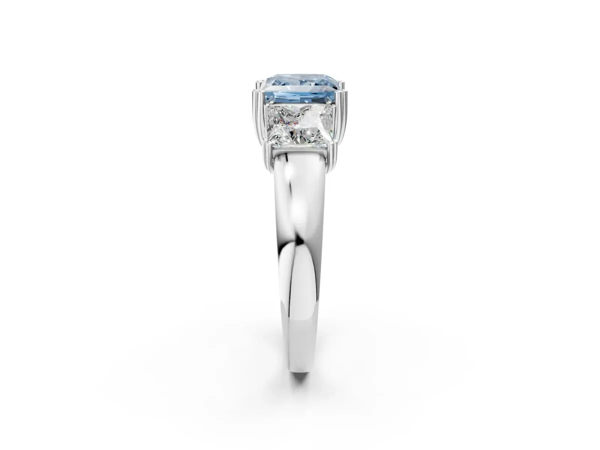 Fancy Blue Three-Stone Princess Cut Cut Diamond Ring with Channel Set Band and Four-Prong Setting Silver