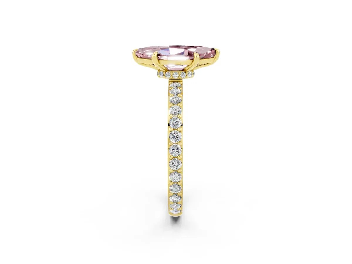 Marquise Cut Morganite Solitaire Engagement Ring with Pavé Band and Four-Prong Setting Yellow gold