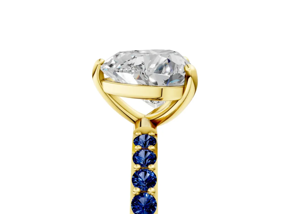 Heart Cut Diamond Solitaire Ring with Round Blue Sapphire Pavé Band and Prong Setting Yellow gold