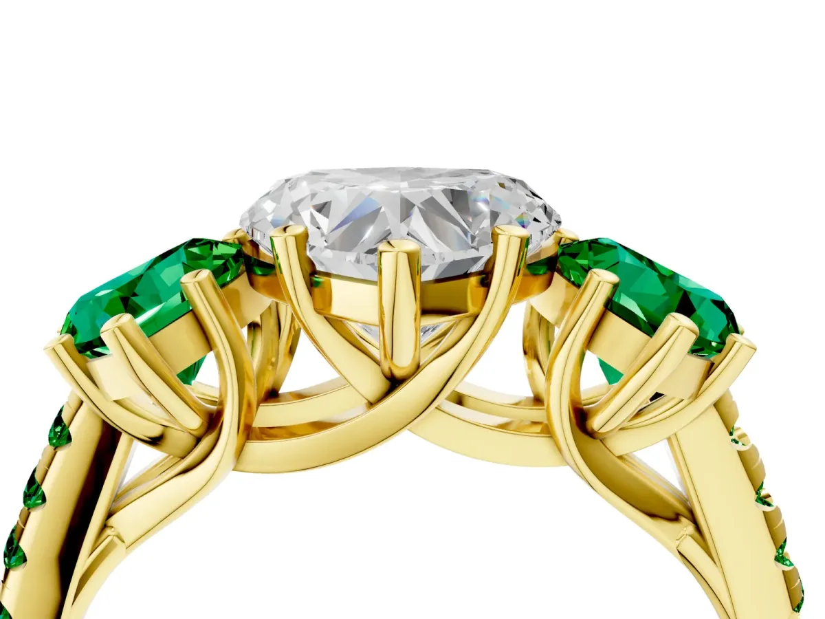 Three-Stone Heart Cut Diamond Ring with Round Emerald Pavé Band and Prong Setting Yellow gold