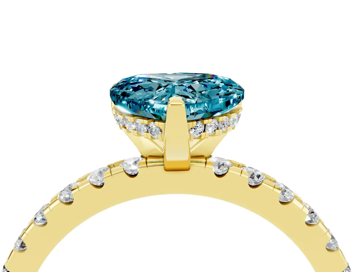 Heart Cut Blue Topaz Solitaire Ring with Round Pavé Band and Four-Prong Setting Yellow gold