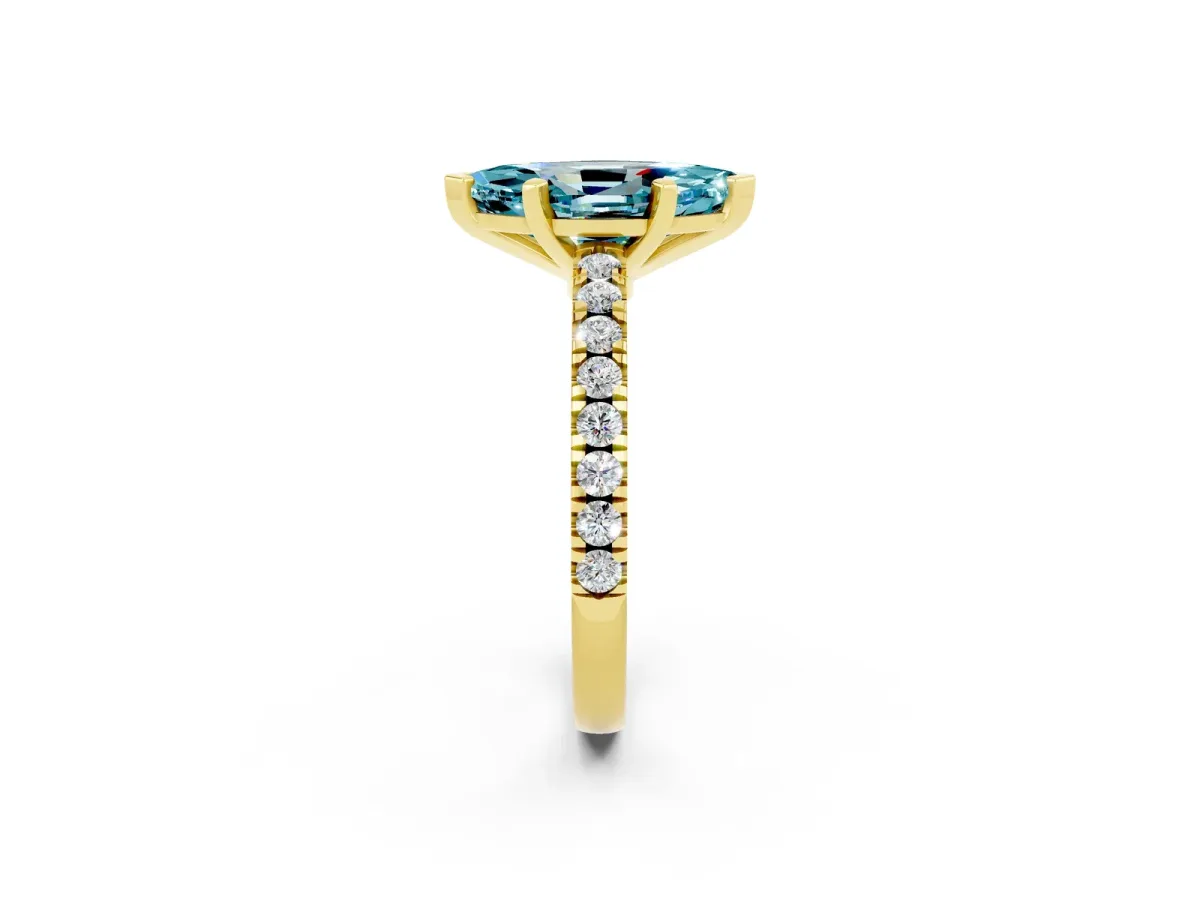 Marquise Cut Solitaire Blue Topaz with Pavé Band and Four-Prong Setting Yellow gold
