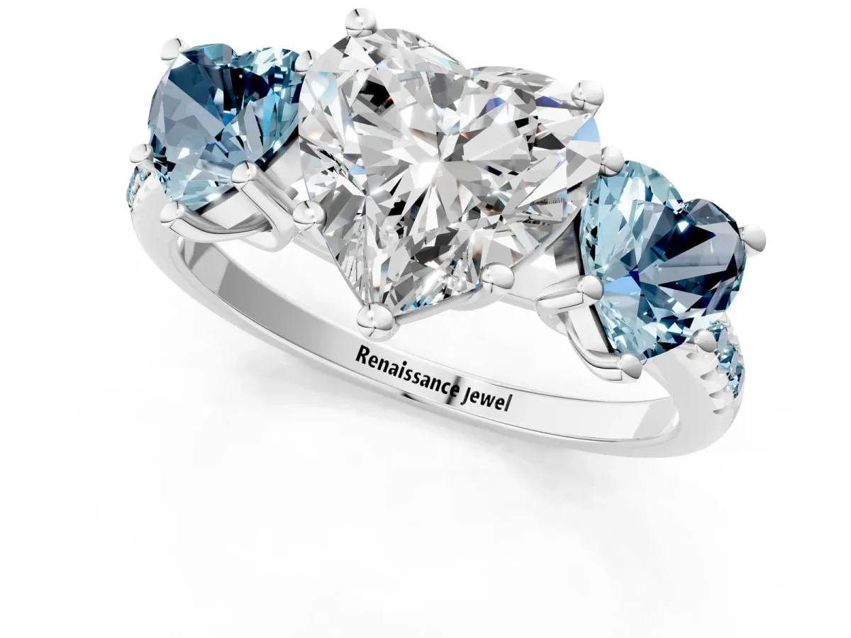 Three-Stone Heart Cut Diamond Ring with Round Aquamarine Pavé Band and Prong Setting White gold