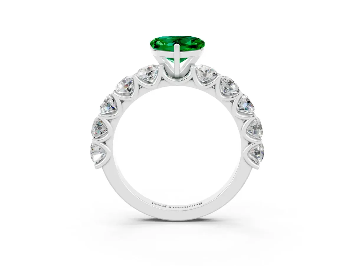 Heart Cut Emerald Prong Setting with Side Stones on a Pave Band Silver