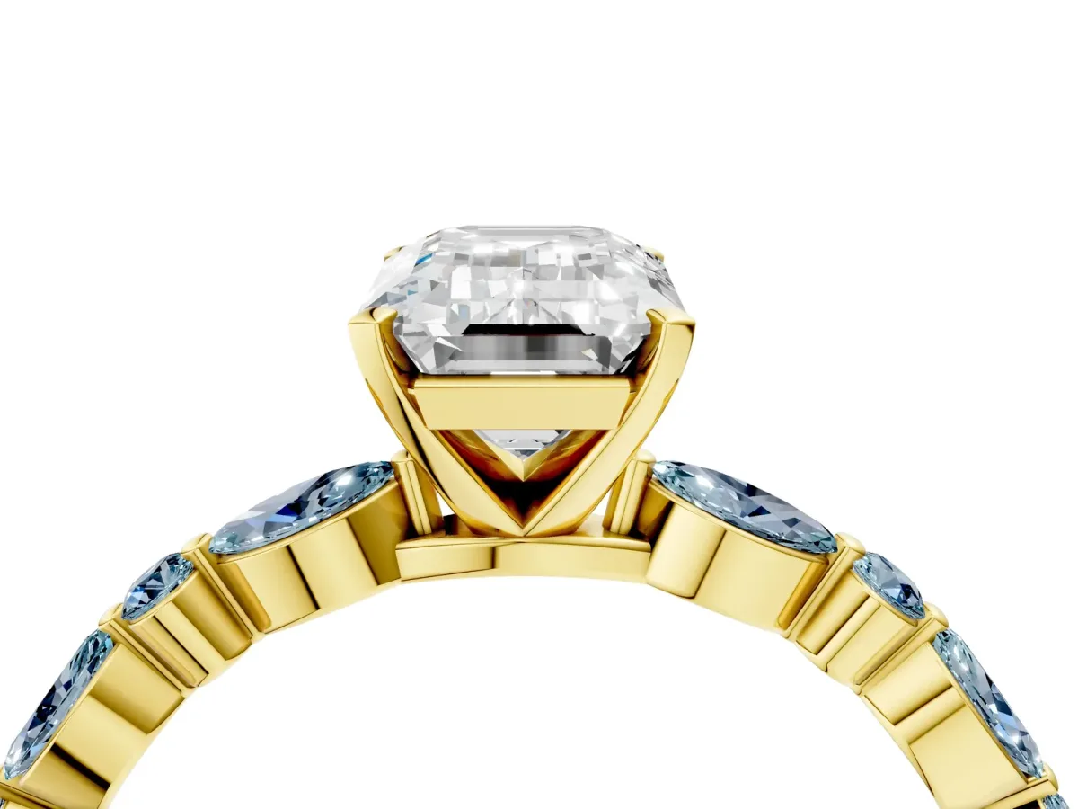 Emerald Cut Diamond Ring with Marquise and Round Aquamarine Side Stones and Four-Prong Setting Yellow gold