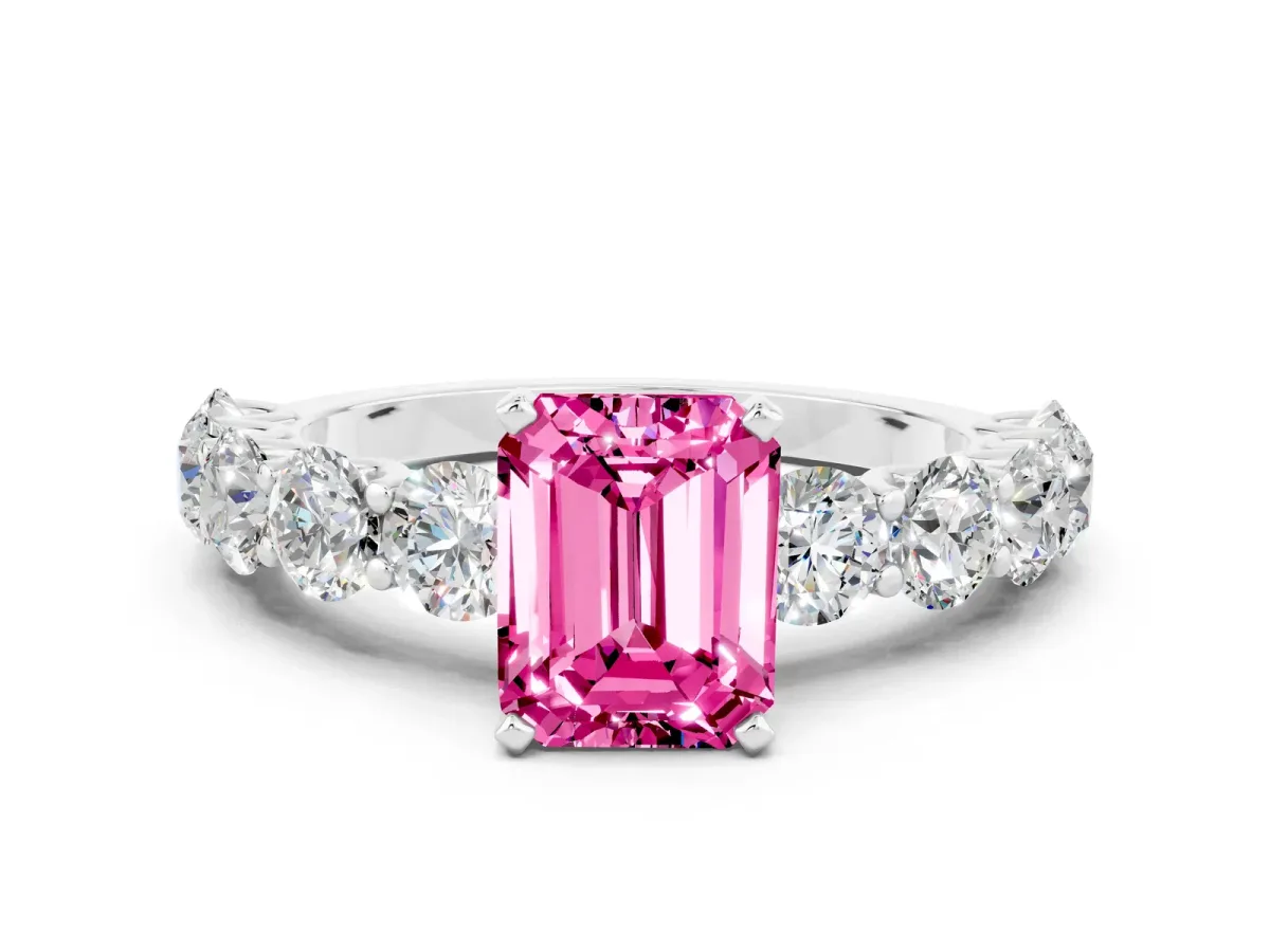Emerald Cut Pink Sapphire Prong Setting with Side Stones on a Pave Band Silver