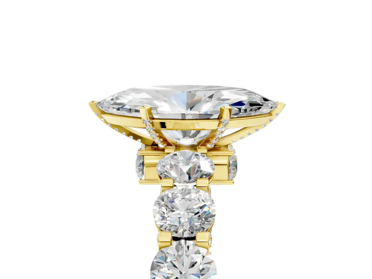 Marquise Cut Diamond Side Stone Engagement Ring with Four-Prong Setting Yellow gold