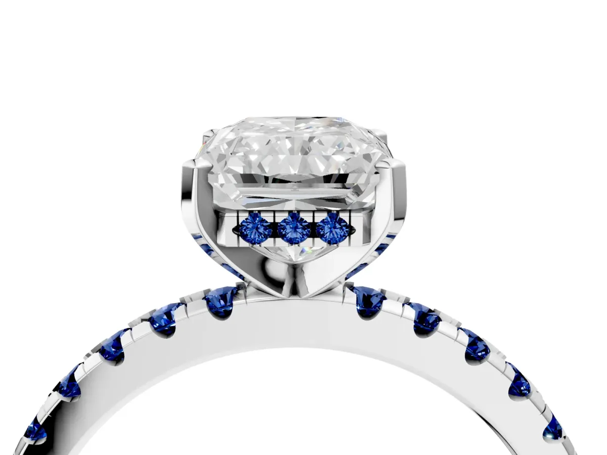 Radiant Cut Diamond Solitaire Ring with Round Blue Sapphire Pavé Band and Four-Prong Setting White gold
