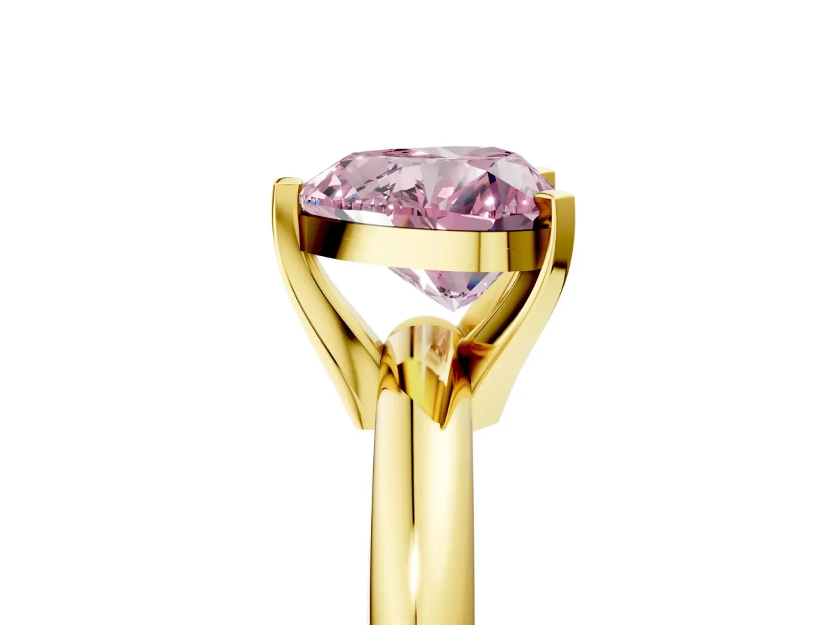 Fancy Pink Heart Cut Diamond Solitaire Engagement Ring with Round Band and Four-Prong Setting Yellow gold