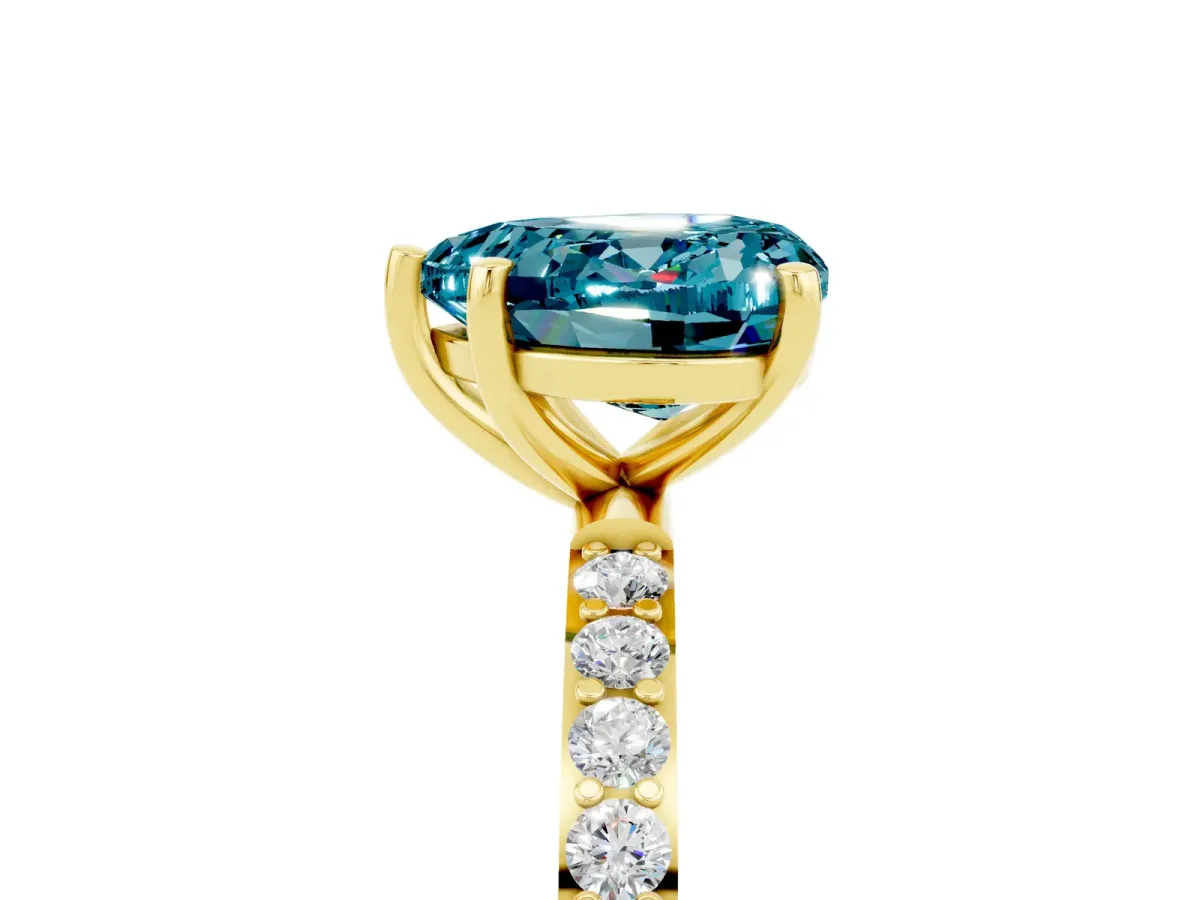 Heart Cut Blue Topaz Solitaire Ring with Round Pavé Band and Prong Setting Yellow gold