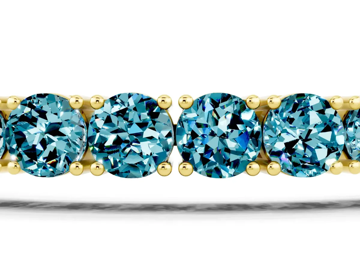 Round Brilliant Blue Topaz Tennis Bracelet with Prong Setting Yellow gold