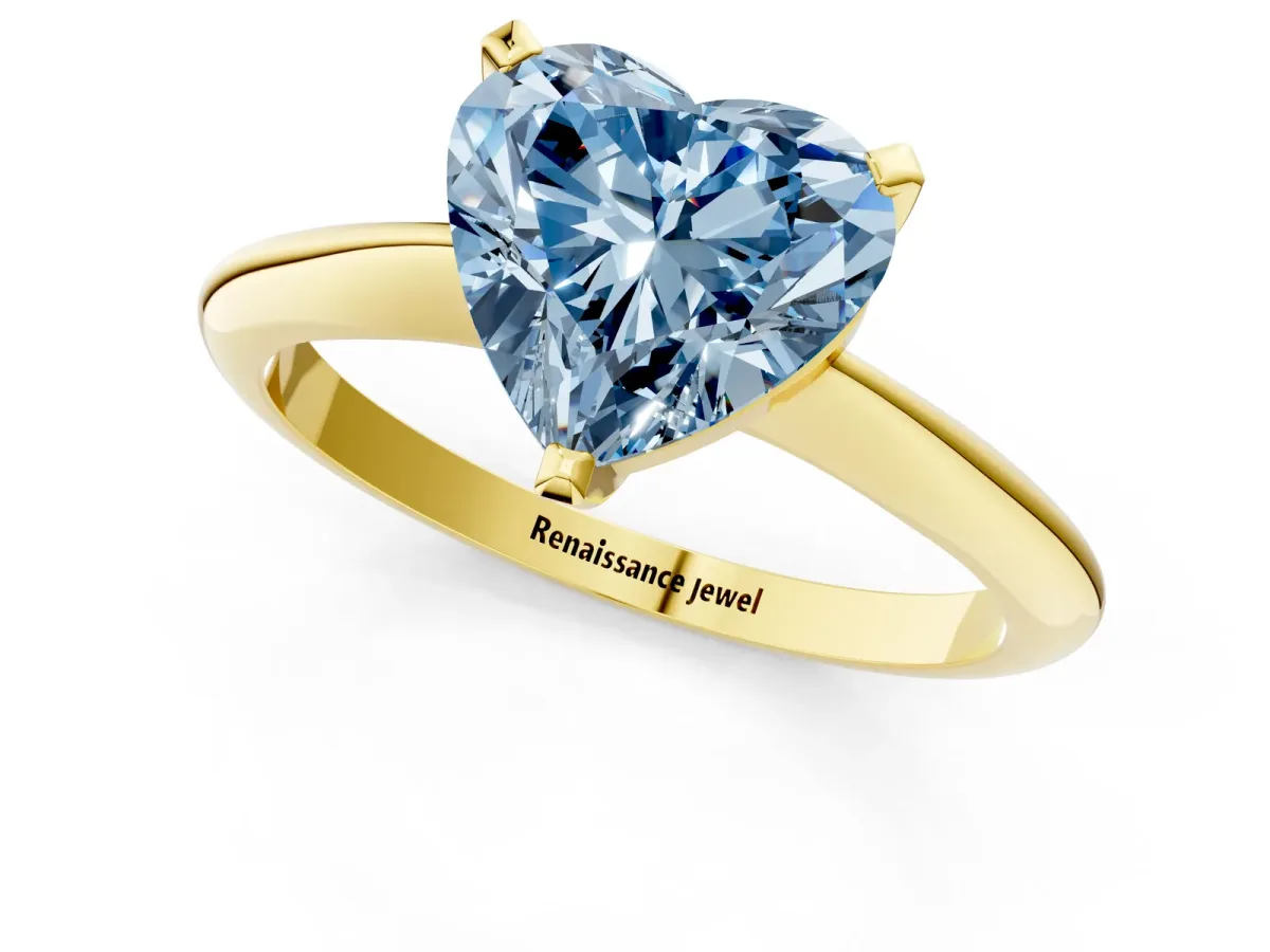 Fancy Blue Heart Cut Diamond Solitaire Engagement Ring with Classic Band and Four-Prong Setting Yellow gold
