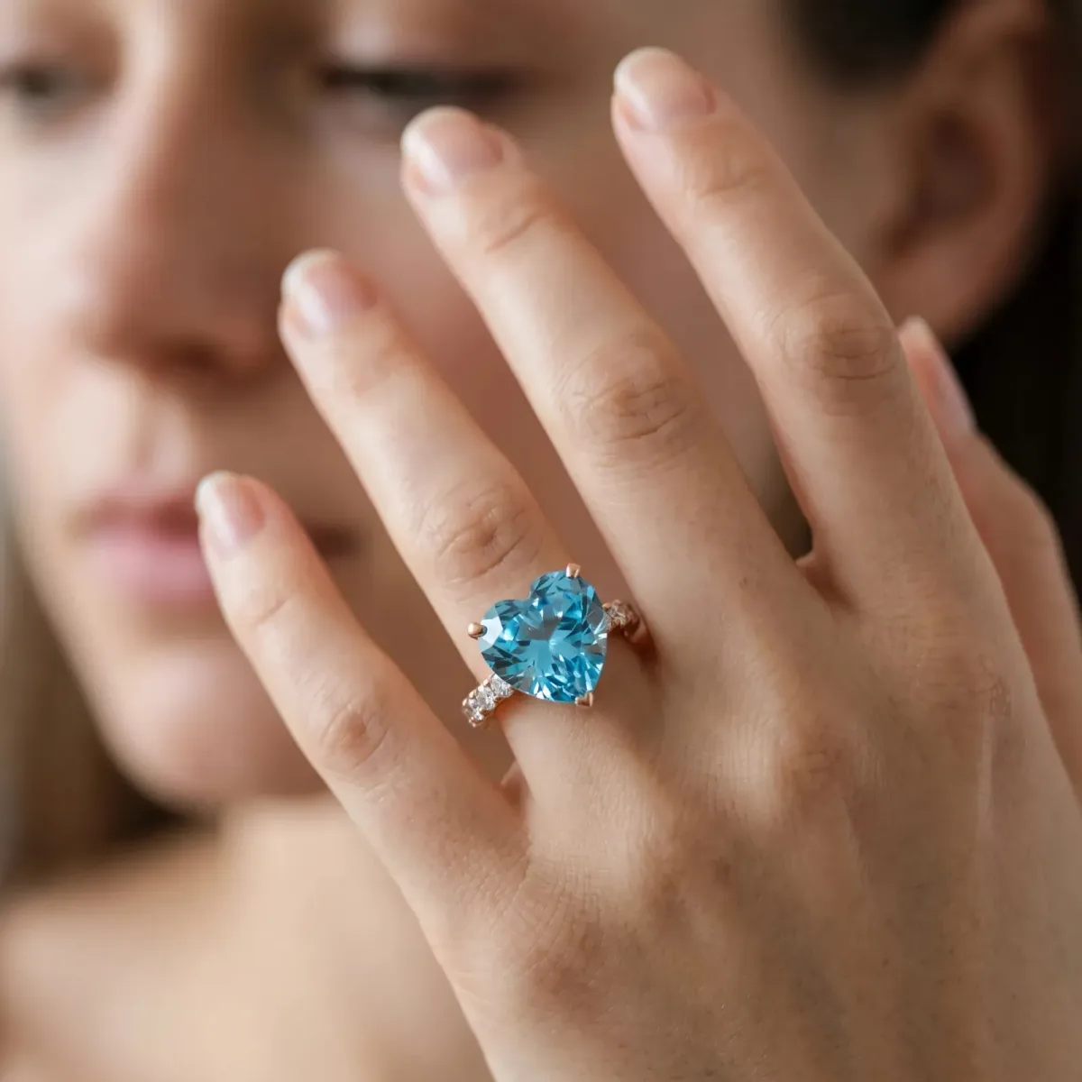 Heart Cut Blue Topaz Solitaire Ring with Round Pavé Band and Four-Prong Setting Rose gold