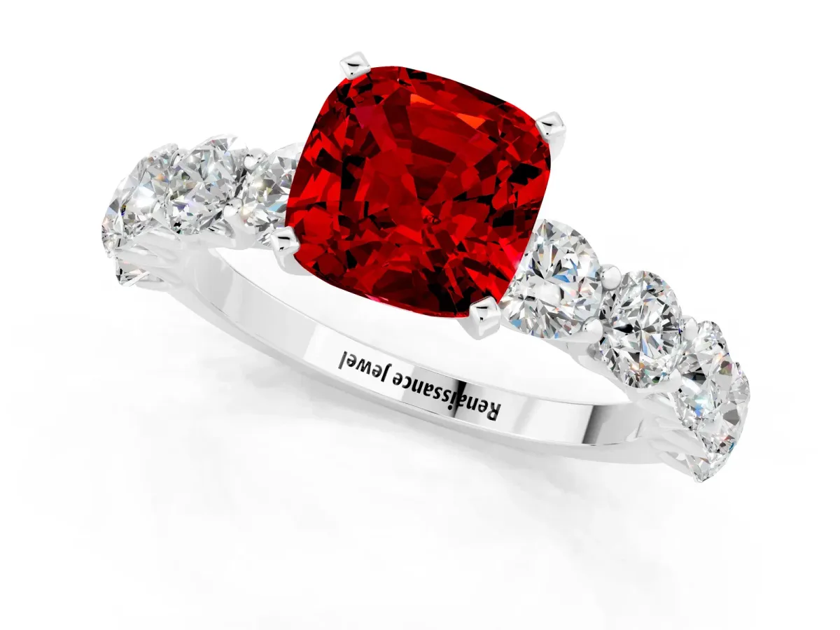 Cushion Cut Ruby Prong Setting with Side Stones on a Pave Band White gold