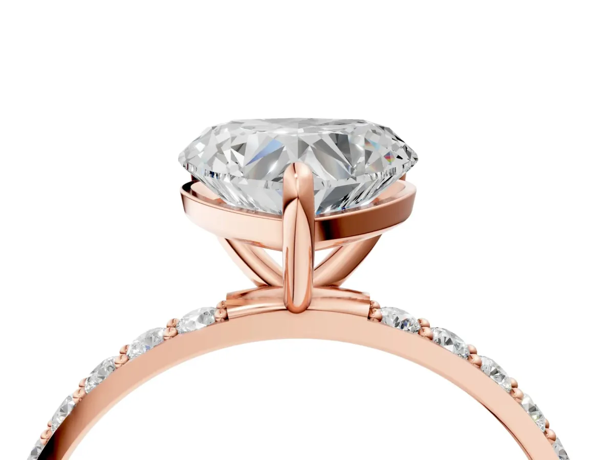 Heart Cut Diamond Solitaire Ring with Round Moissanite Pavé Band and Prong Setting Rose gold