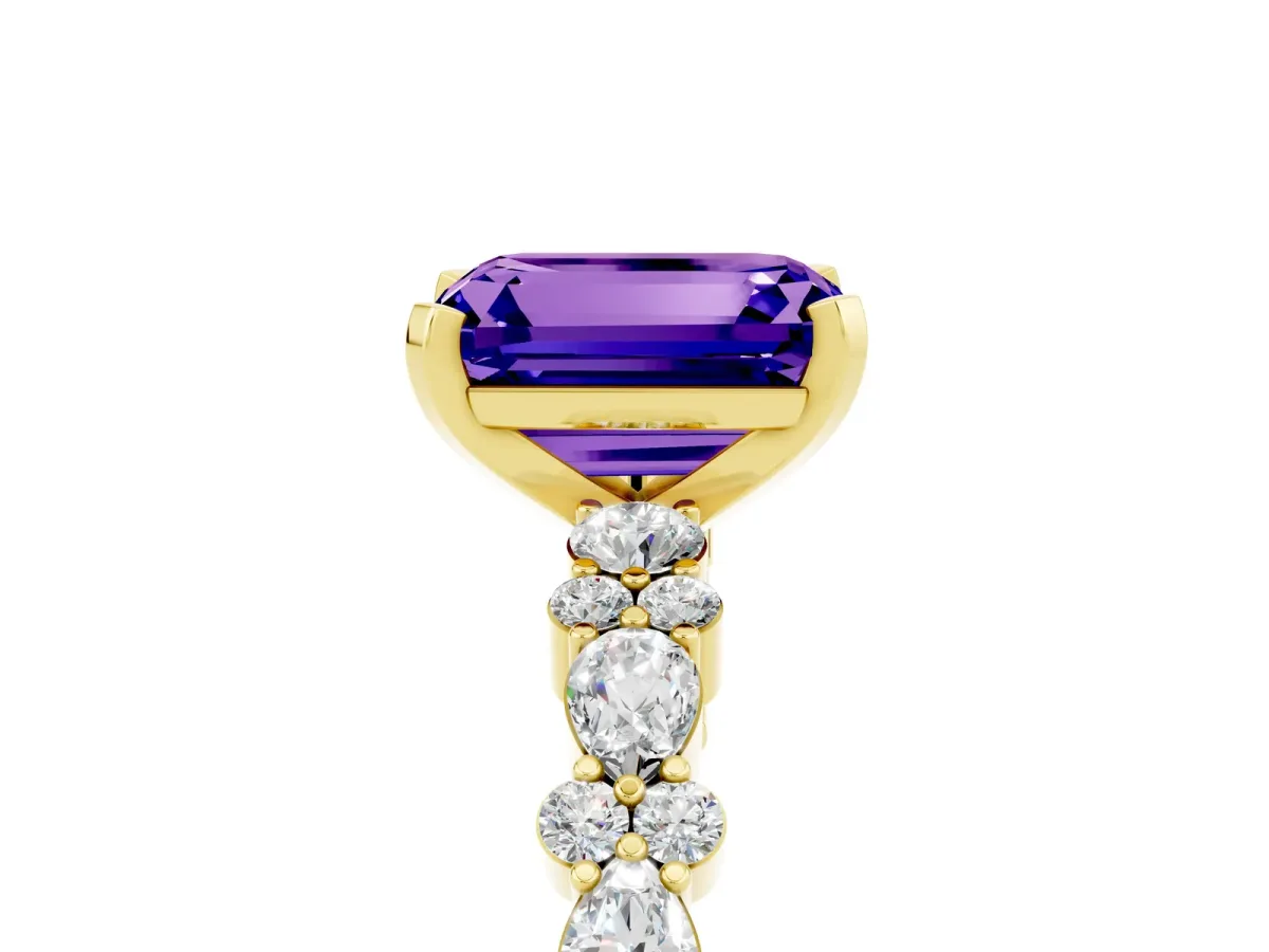 Emerald Cut Tanzanite Side Stone Solitaire Ring with Round and Four-Prong Setting Yellow gold