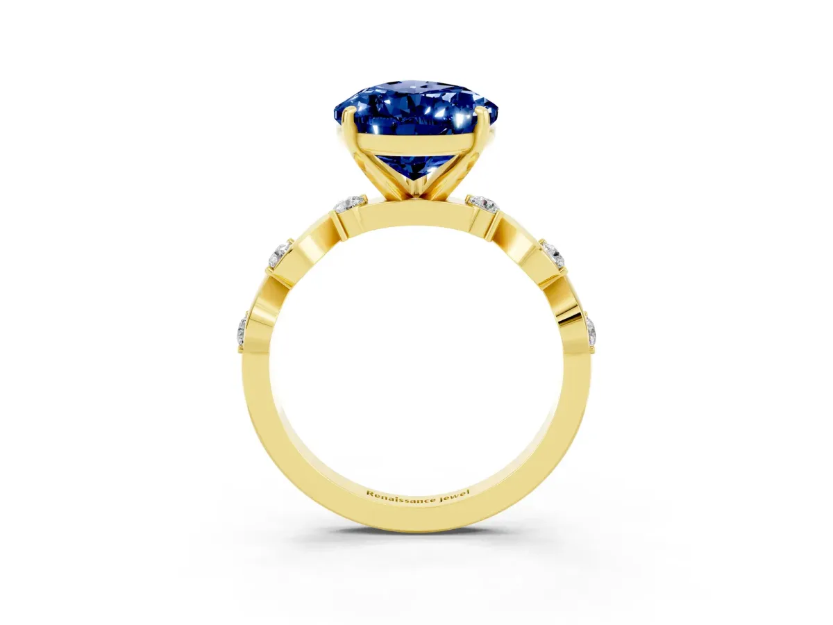 Pear Cut Blue Sapphire Solitaire Twisted Band with Round Accents and Prong Setting Yellow gold