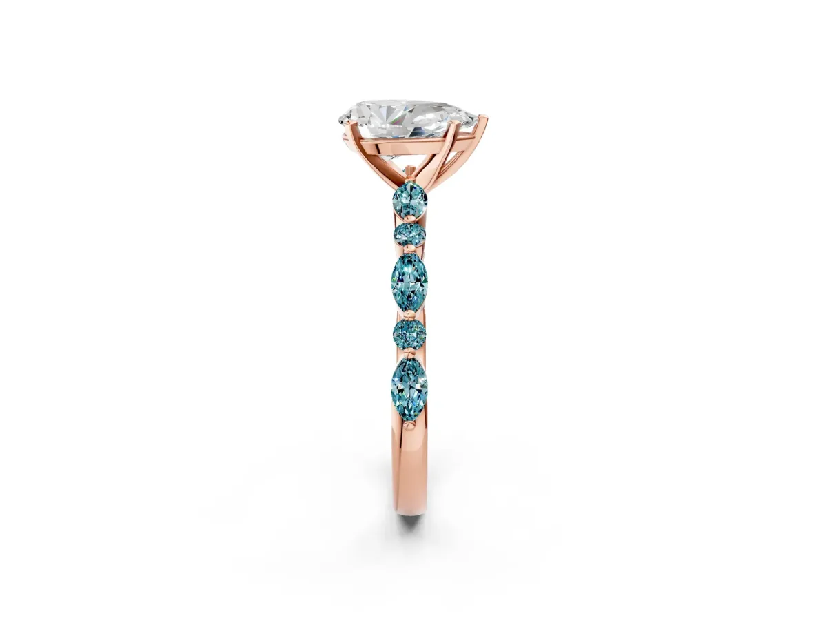 Pear Cut Diamond Ring with Marquise and Round Blue Topaz Side Stones and Four-Prong Setting Rose gold