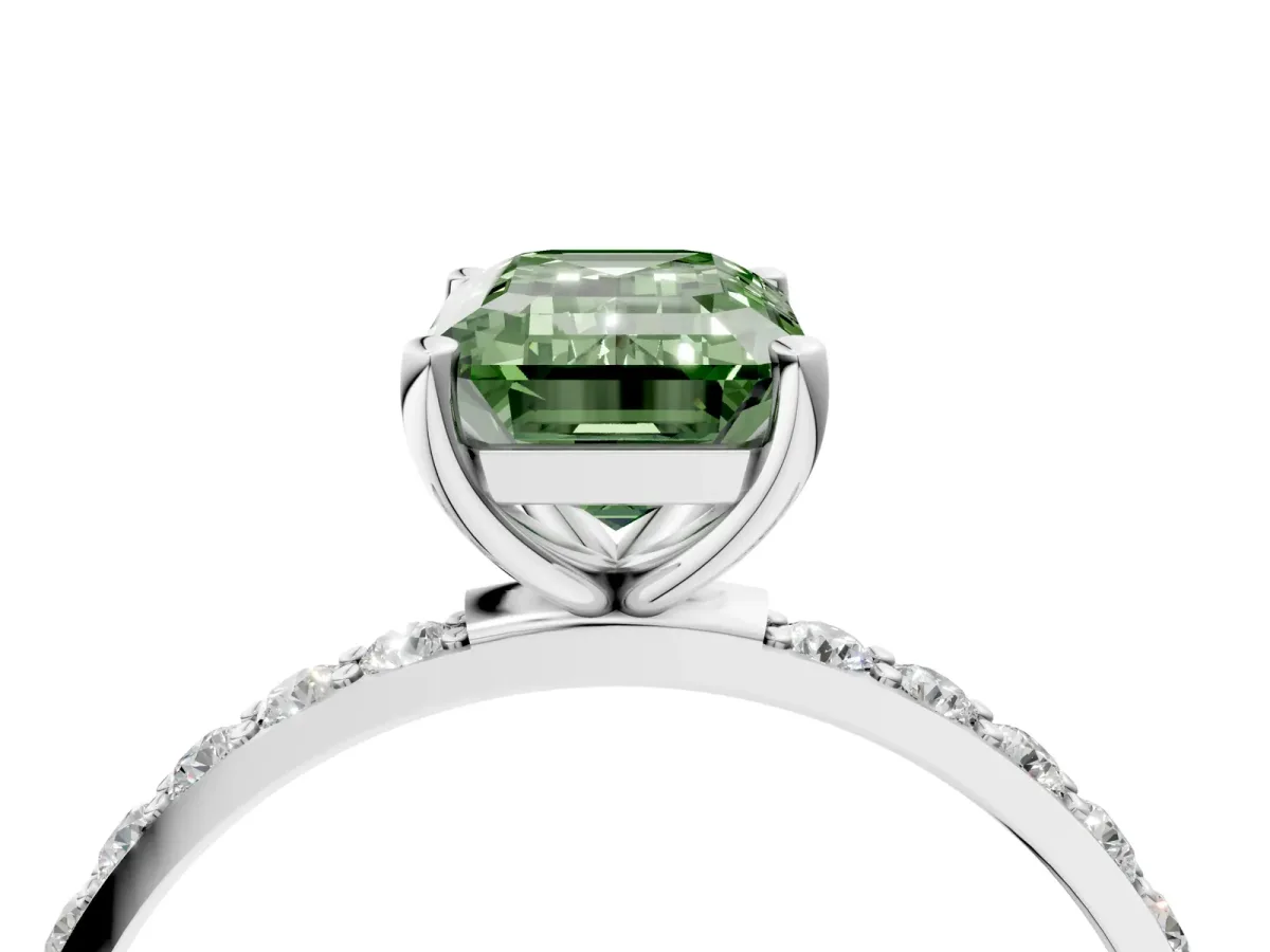 Fancy Green Emerald Cut Diamond Solitaire Ring with Round Pavé Shoulders and Prong Setting Silver