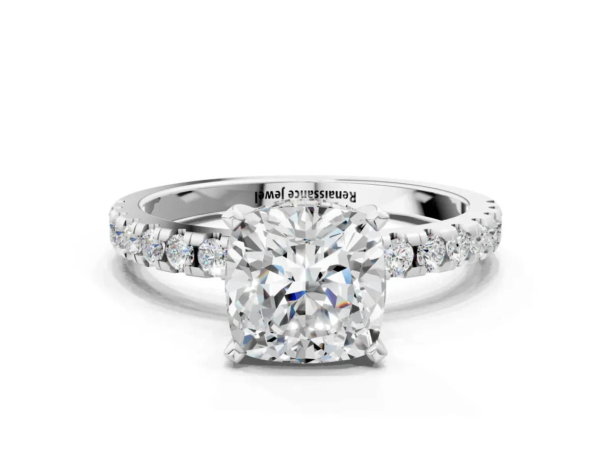 Cushion Cut Diamond Solitaire Ring with Round Moissanite Pavé Band and Four-Prong Setting White gold