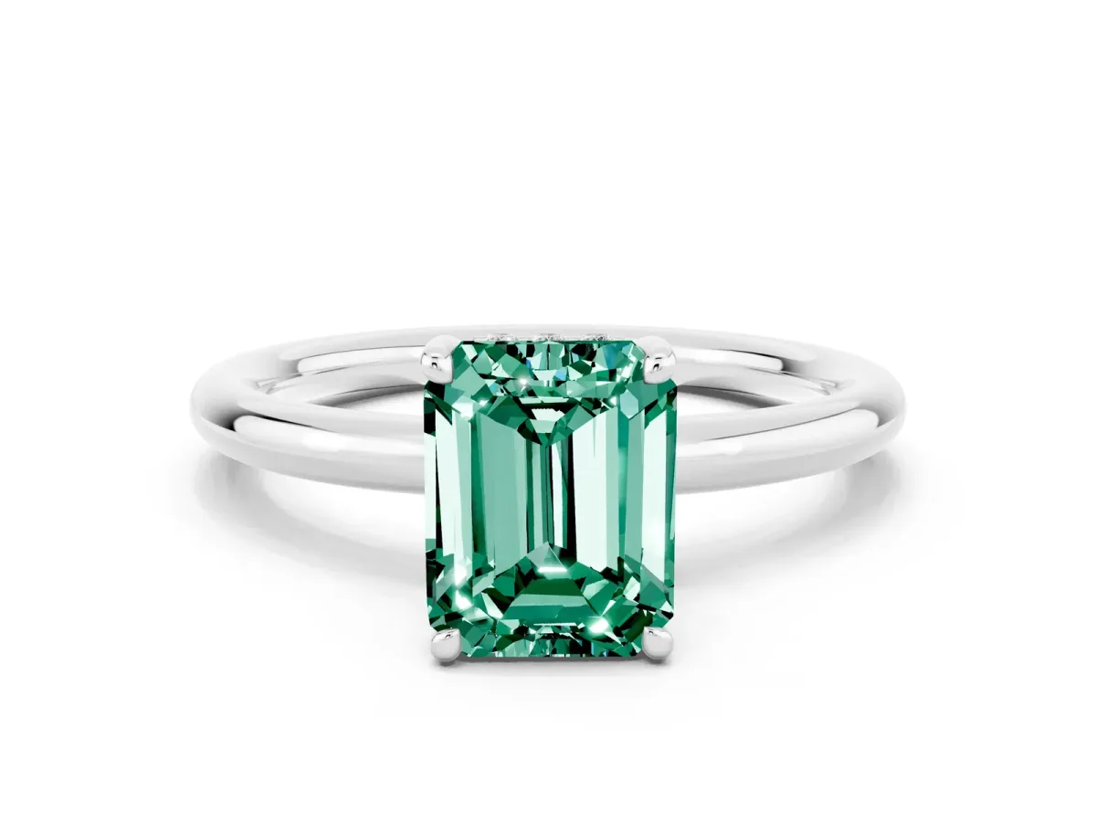 Emerald Cut Green Sapphire Solitaire Ring with Thin Band and Four-Prong Setting White gold