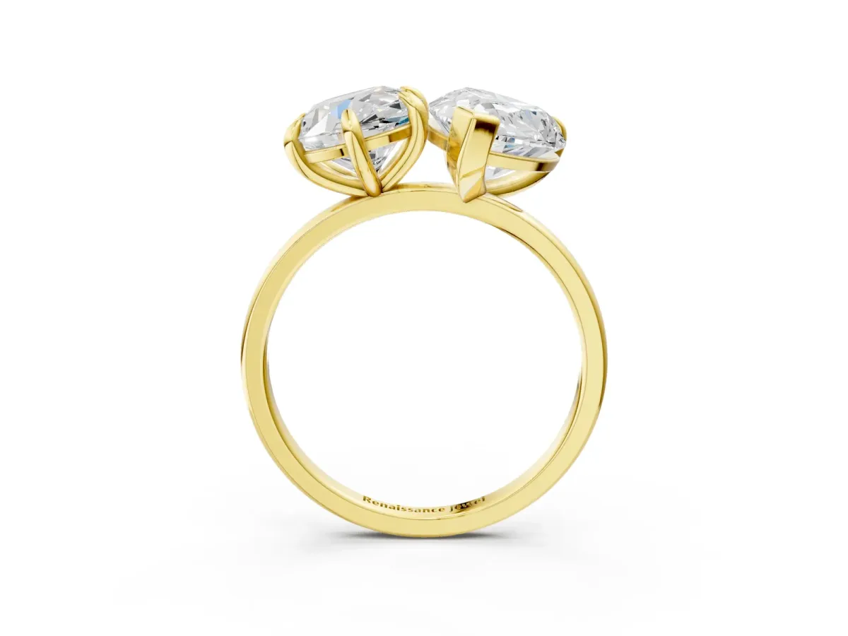 Round Cut and pear toi moi ring Yellow gold