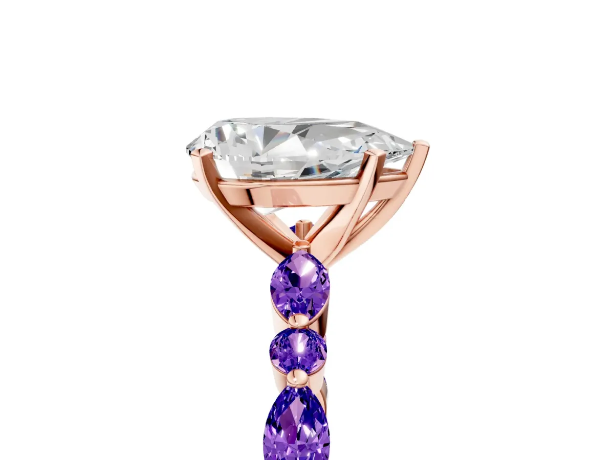 Pear Cut Diamond Ring with Marquise and Round Tanzanite Side Stones and Four-Prong Setting Rose gold