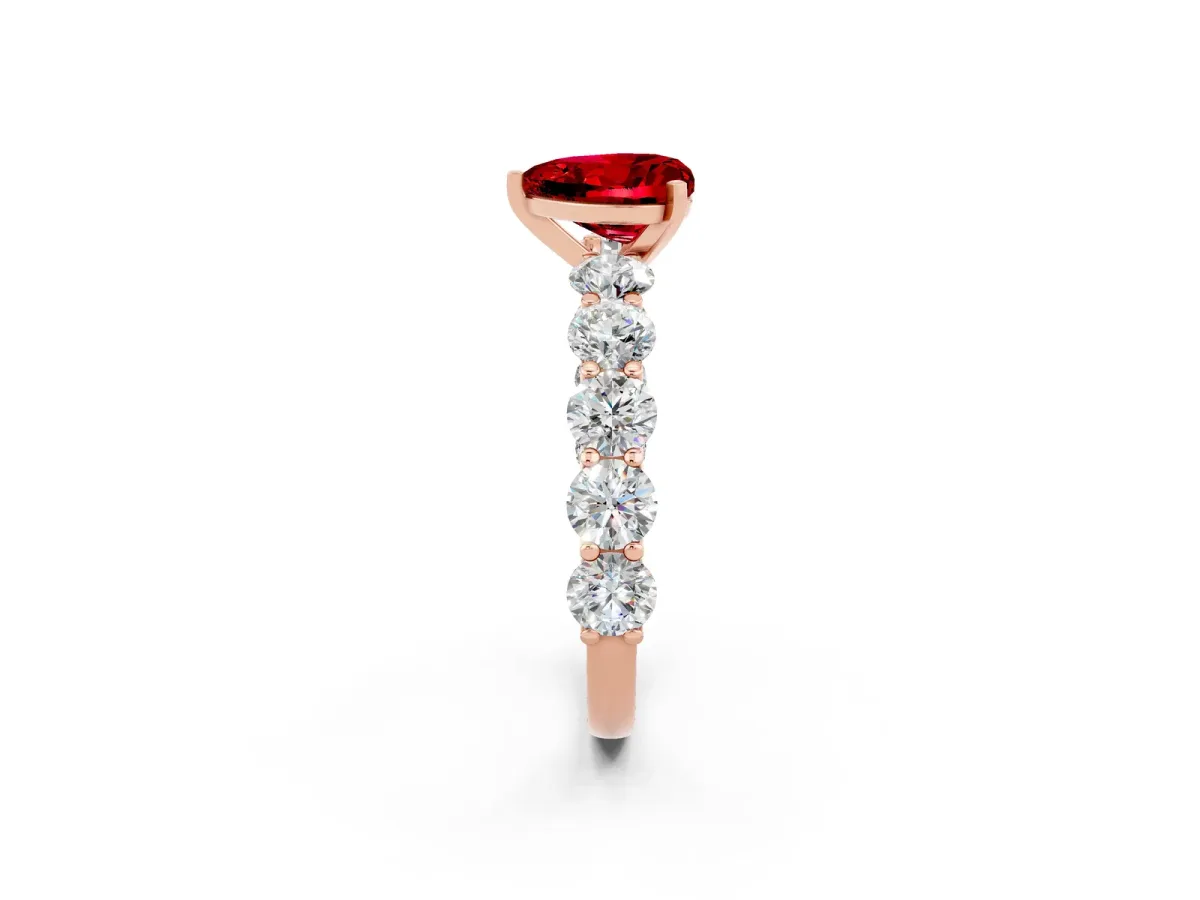 Heart Cut Ruby Prong Setting with Side Stones on a Pave Band Rose gold