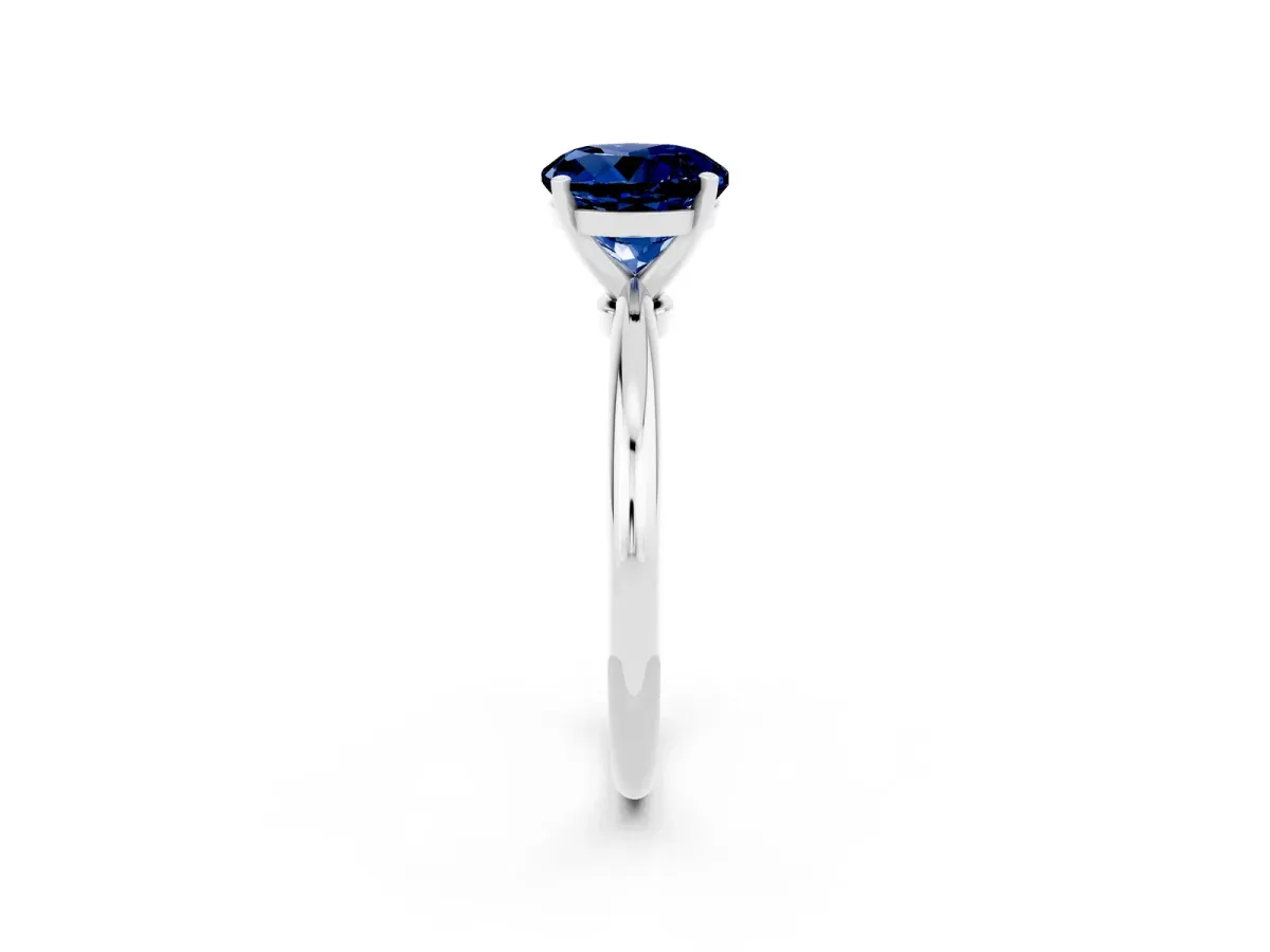 Round Cut Blue Sapphire Solitaire Ring with Six-Prong Setting and Classic Band Silver