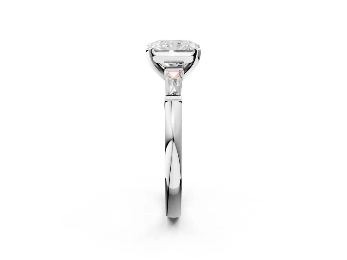 Radiant Cut Solitaire with Tapered Baguette Side Stones on a Classic Band with Four-Prong Setting Platinum