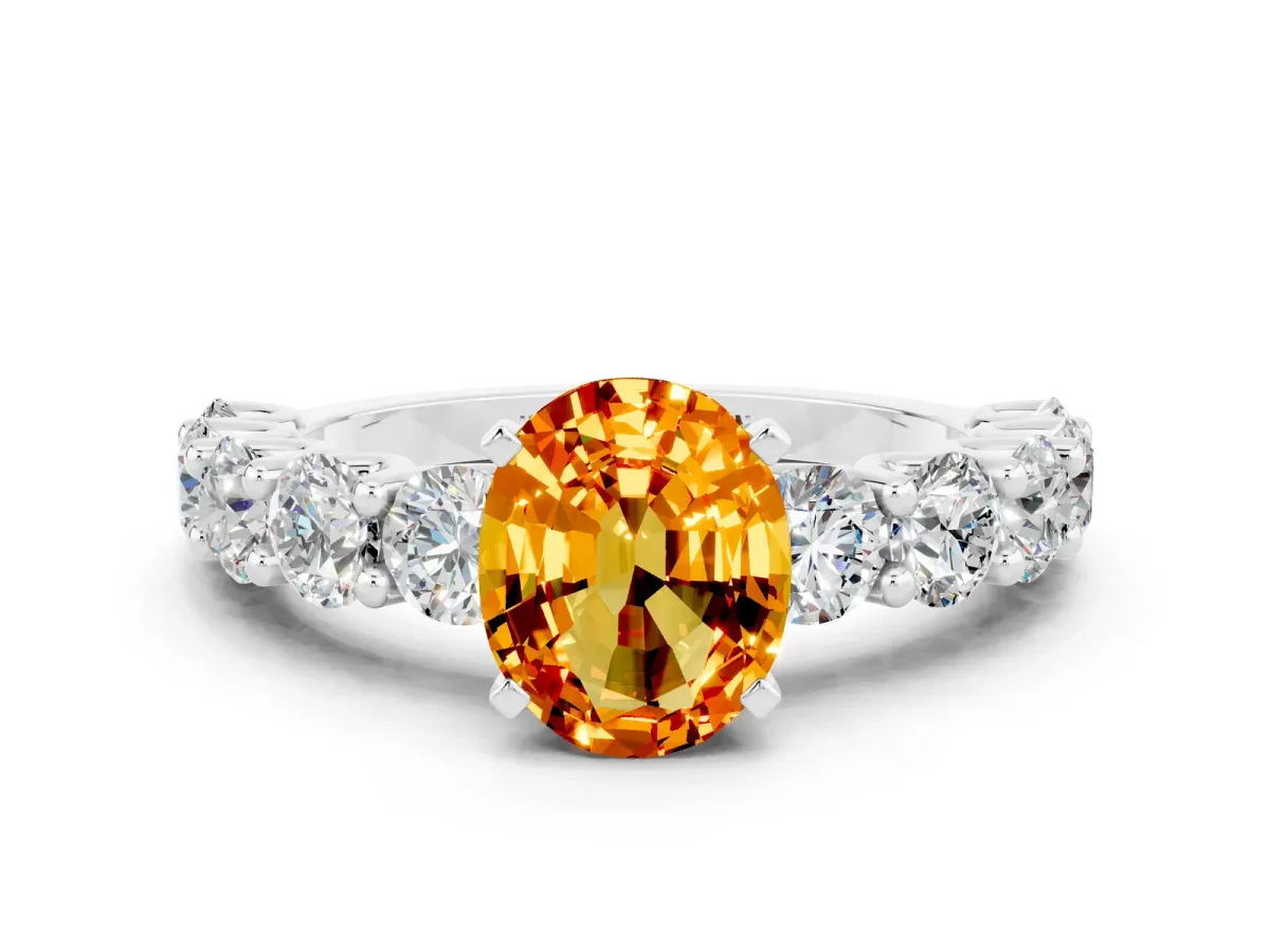 Oval Cut Citrine Prong Setting with Side Stones on a Pave Band Silver