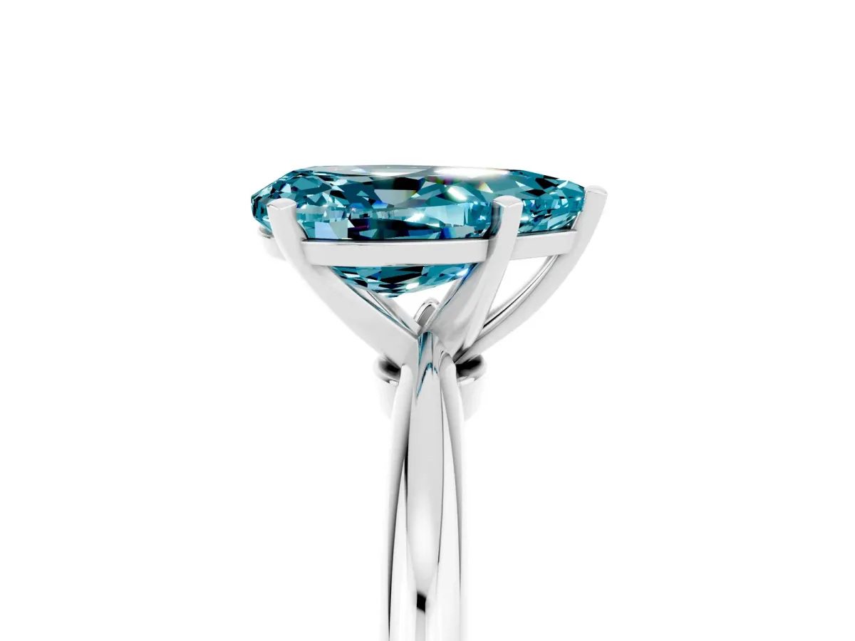 Pear Cut Blue Topaz Solitaire Ring with Six-Prong Setting and Classic Band Platinum