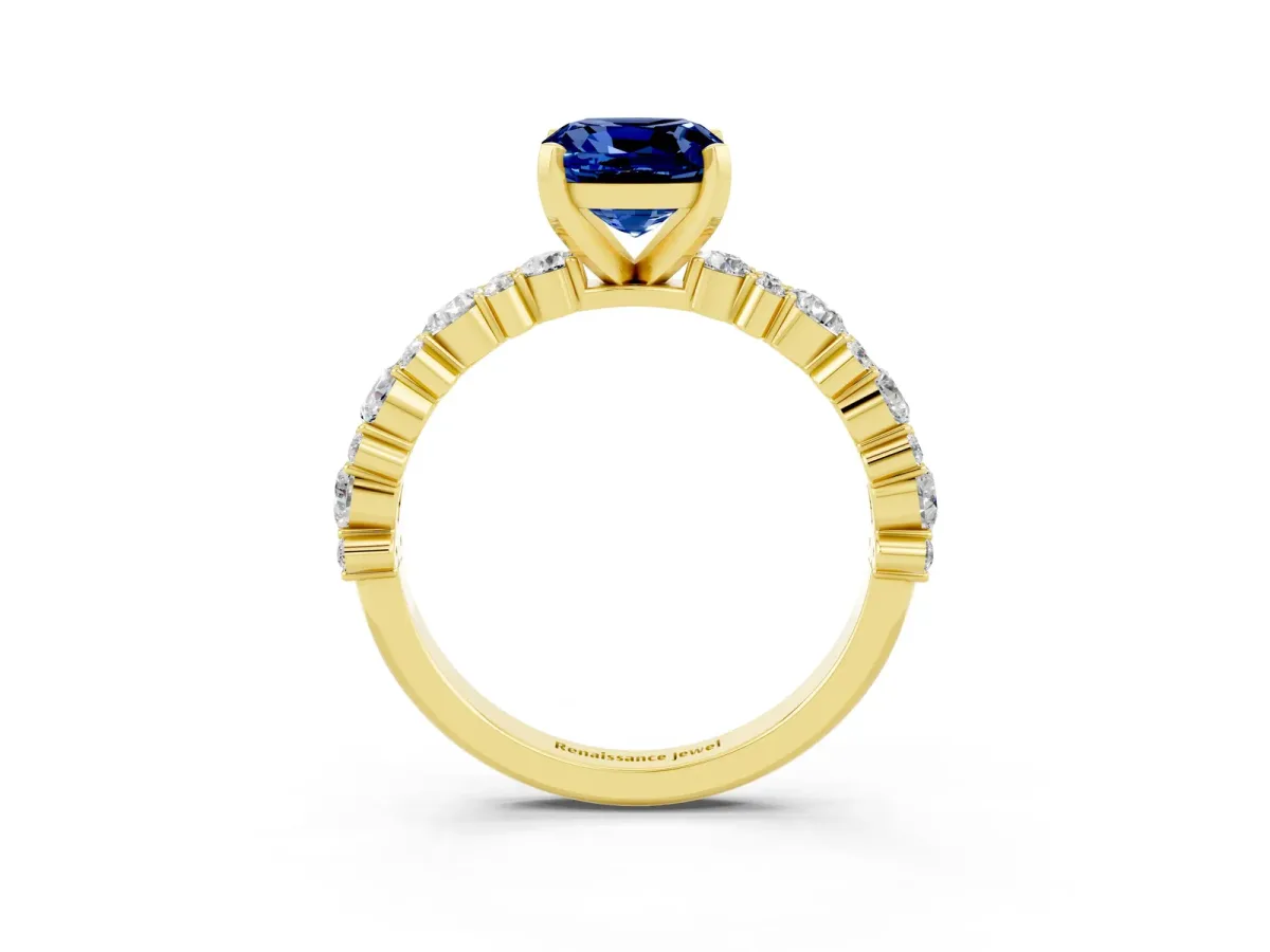 Cushion Cut Blue Sapphire Side Stone Solitaire Ring with Round and Four-Prong Setting Yellow gold
