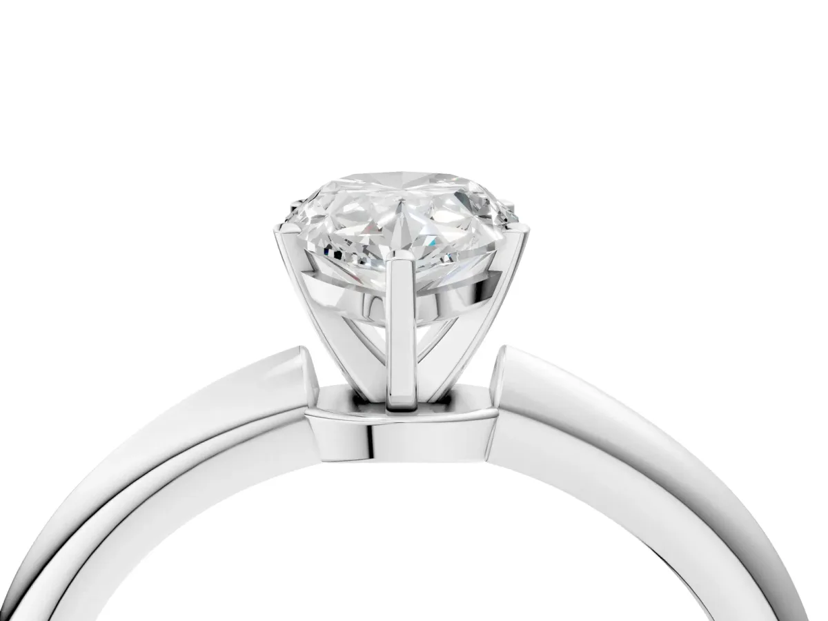 Pear Cut Diamond Solitaire Ring with Six-Prong Setting and Classic Band Platinum