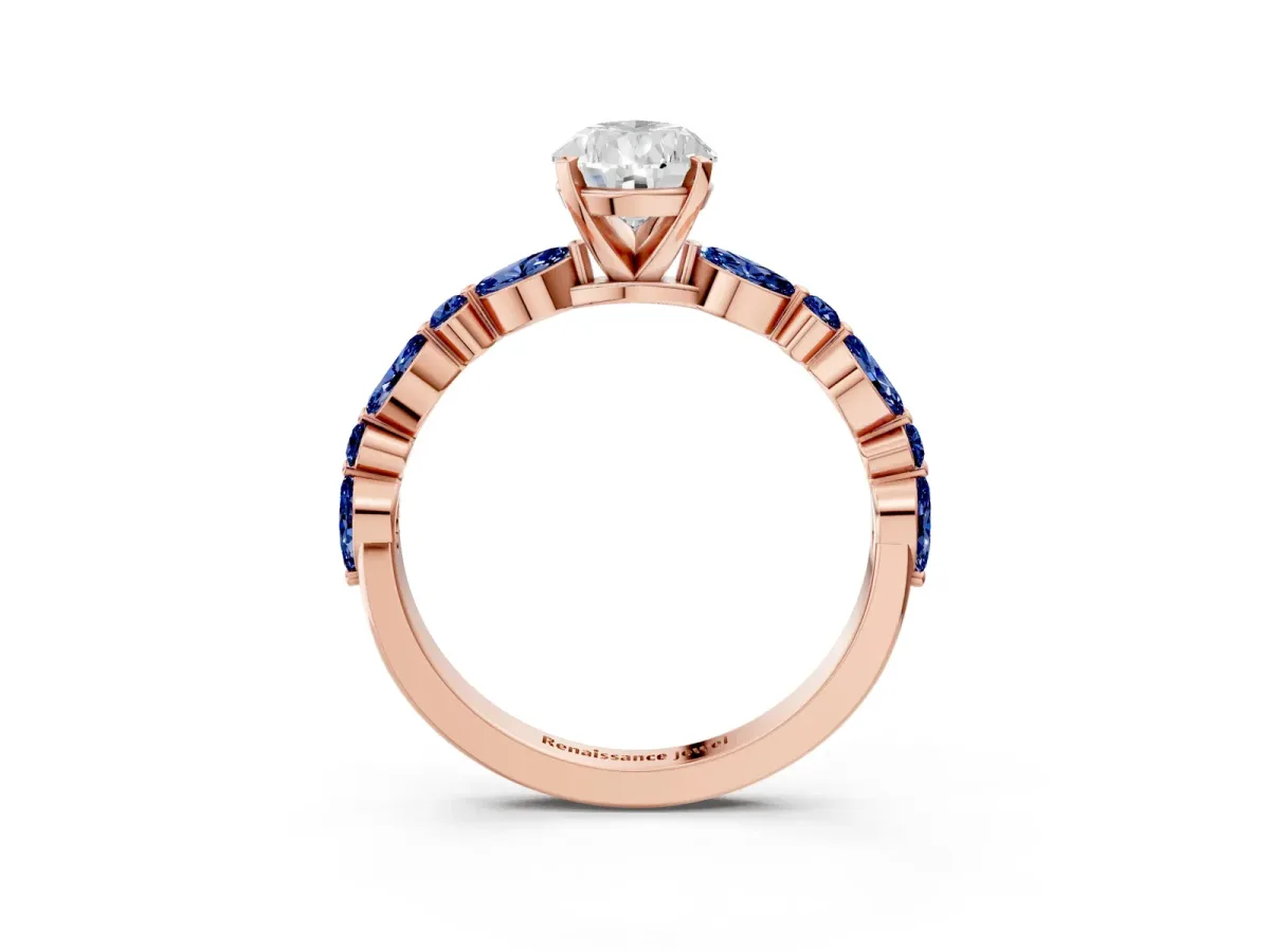 Pear Cut Diamond Ring with Marquise and Round Blue Sapphire Side Stones and Four-Prong Setting Rose gold